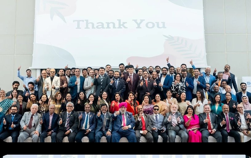 Group stage photo with Thank You banner